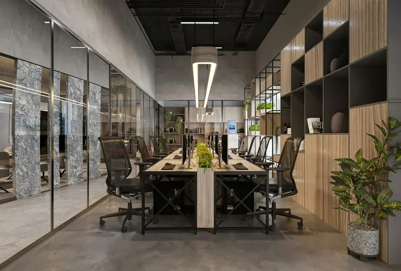 Finished commercial office with a long meeting table and glass walls